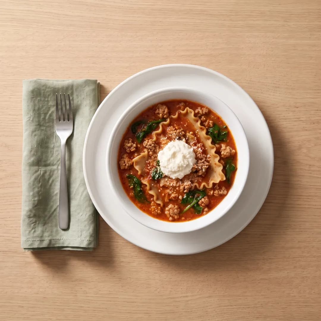 Bowl of lighter lasagna soup with ricotta