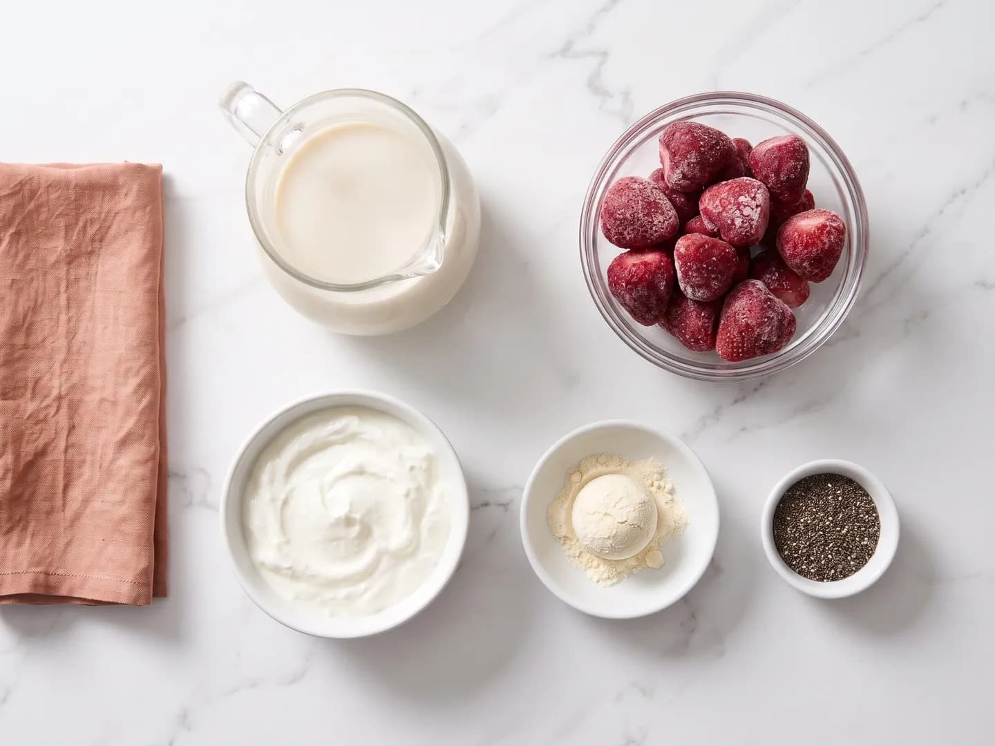 Ingredients for a strawberry protein smoothie