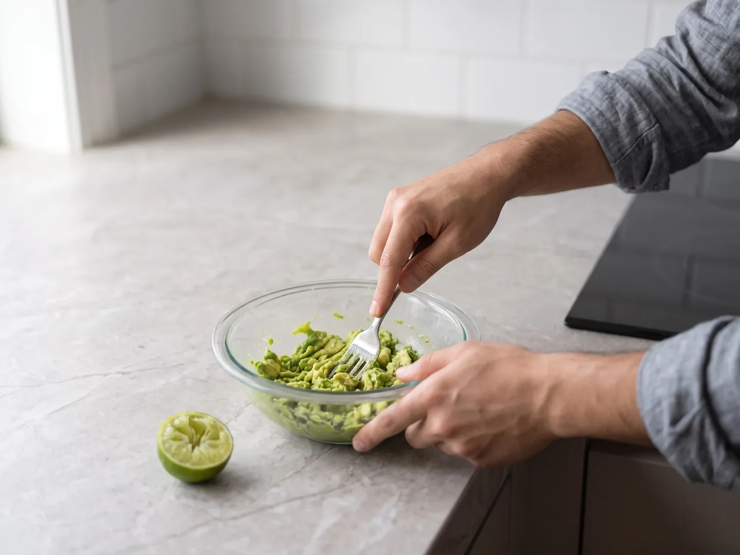 Mashing avocado for guacamole