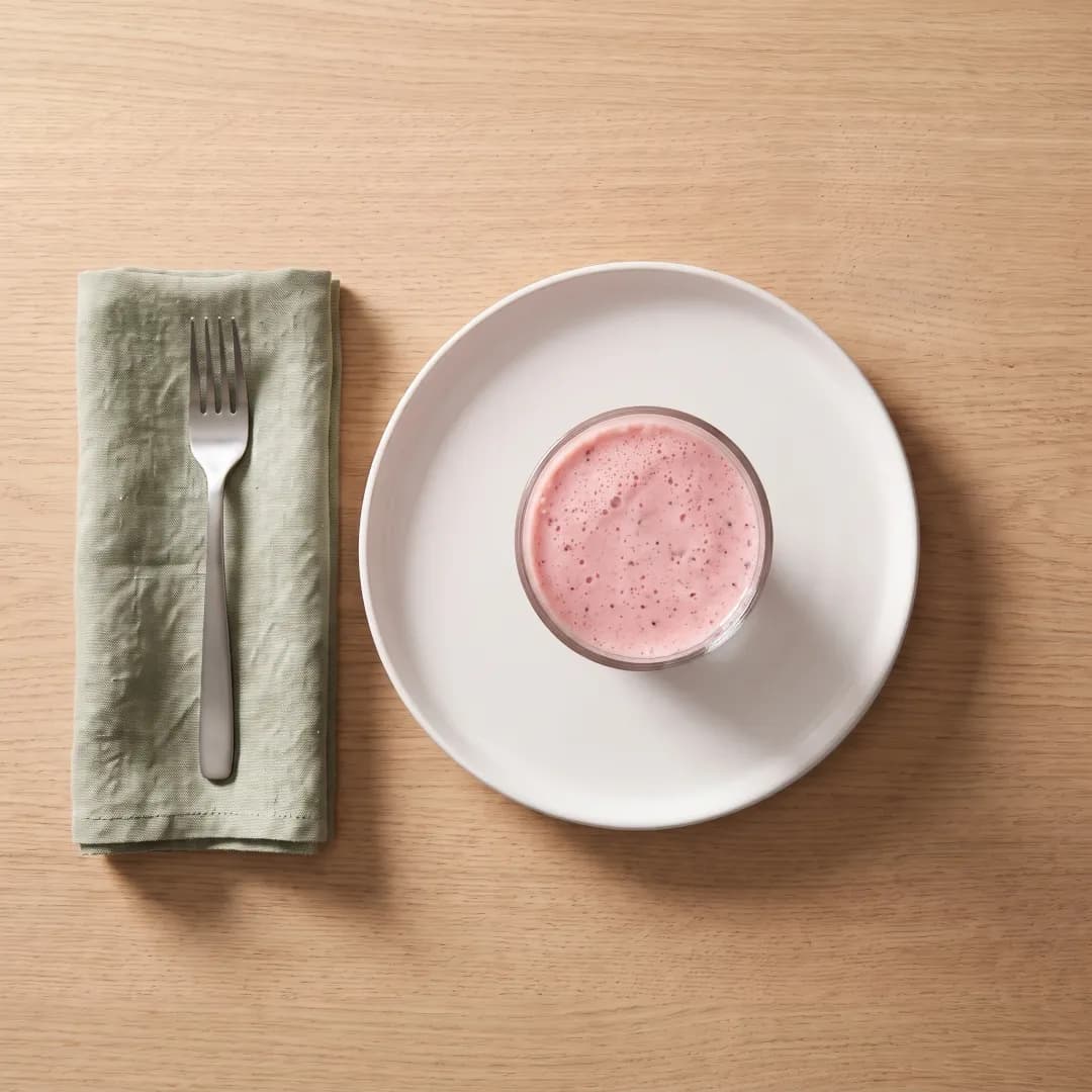 Glass of strawberry protein smoothie