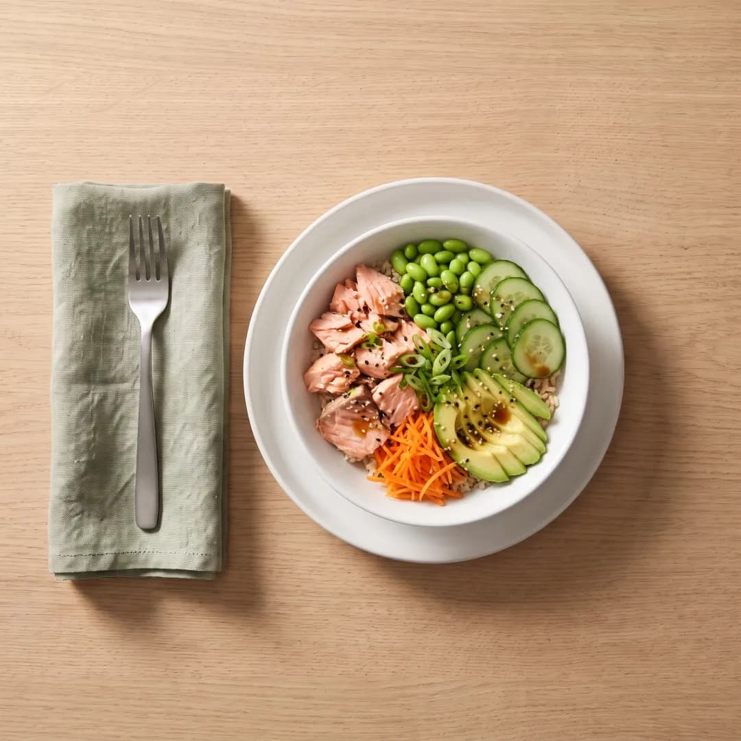 Salmon bowl with brown rice, edamame, cucumber and avocado