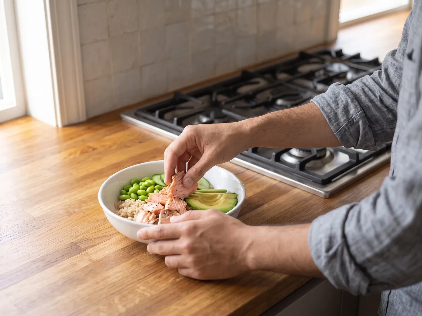 Assembling a salmon bowl